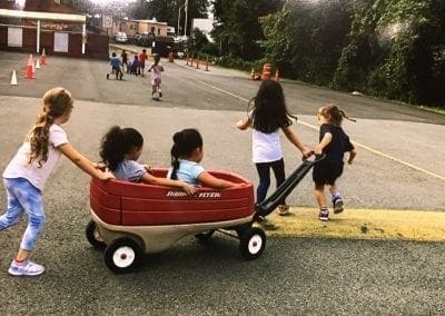 tom thumb summer camp pulling the wagon of kids