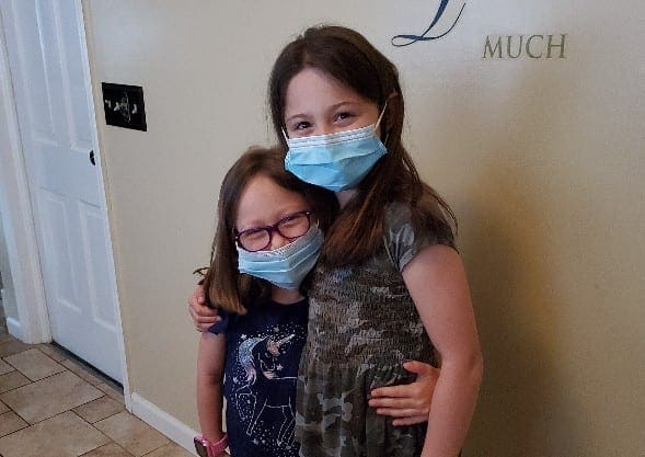 Jackie and Lia Wearing Masks